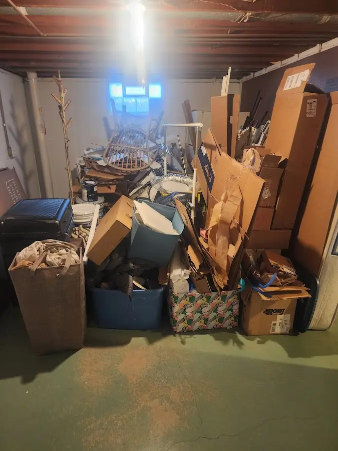 Roll-off dumpster container at job site for 2 Yard Dumpster Rental in Fulton